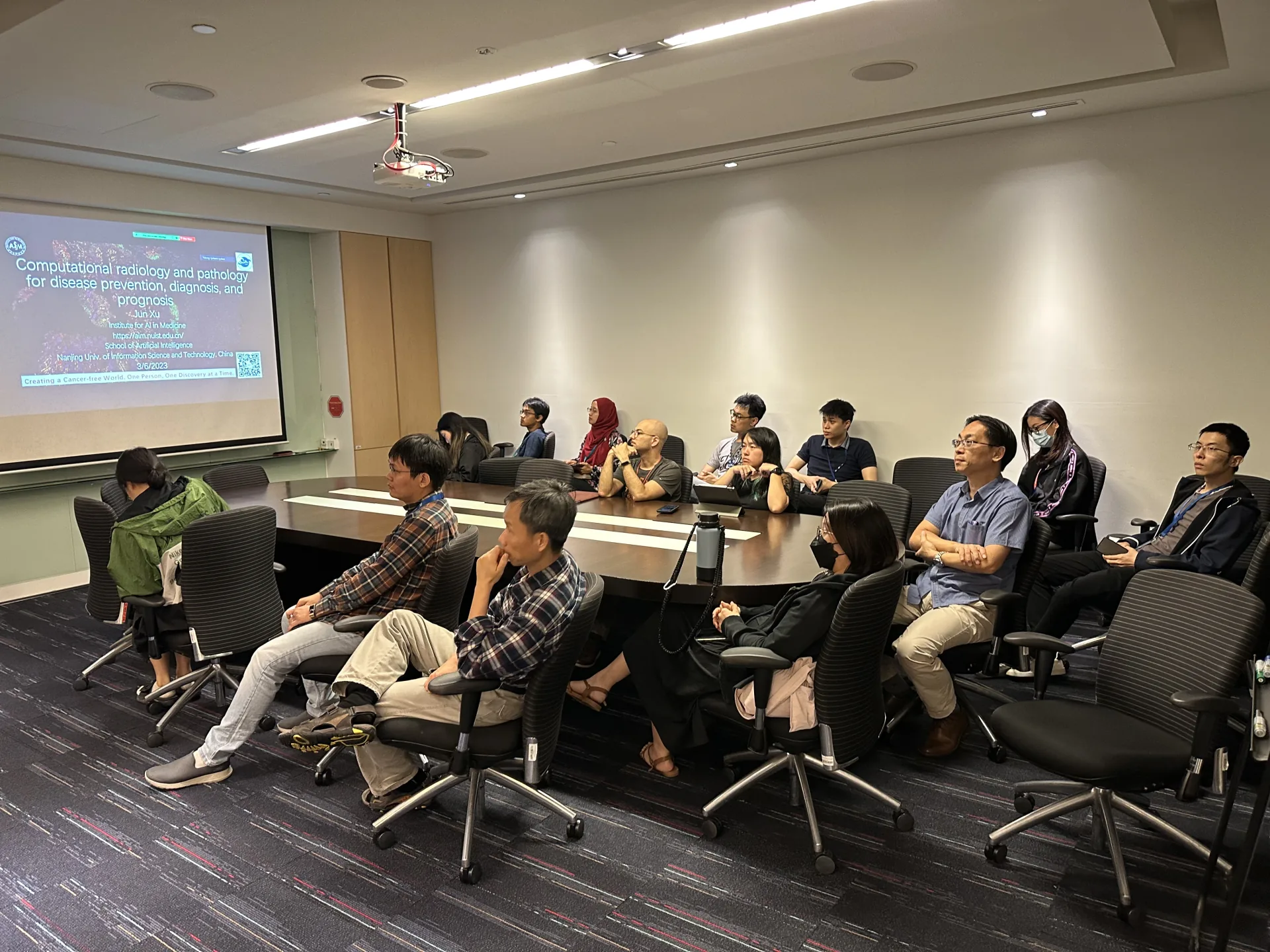 Professor Xu Jun visited the Singapore Science and Technology Agency and gave an academic report