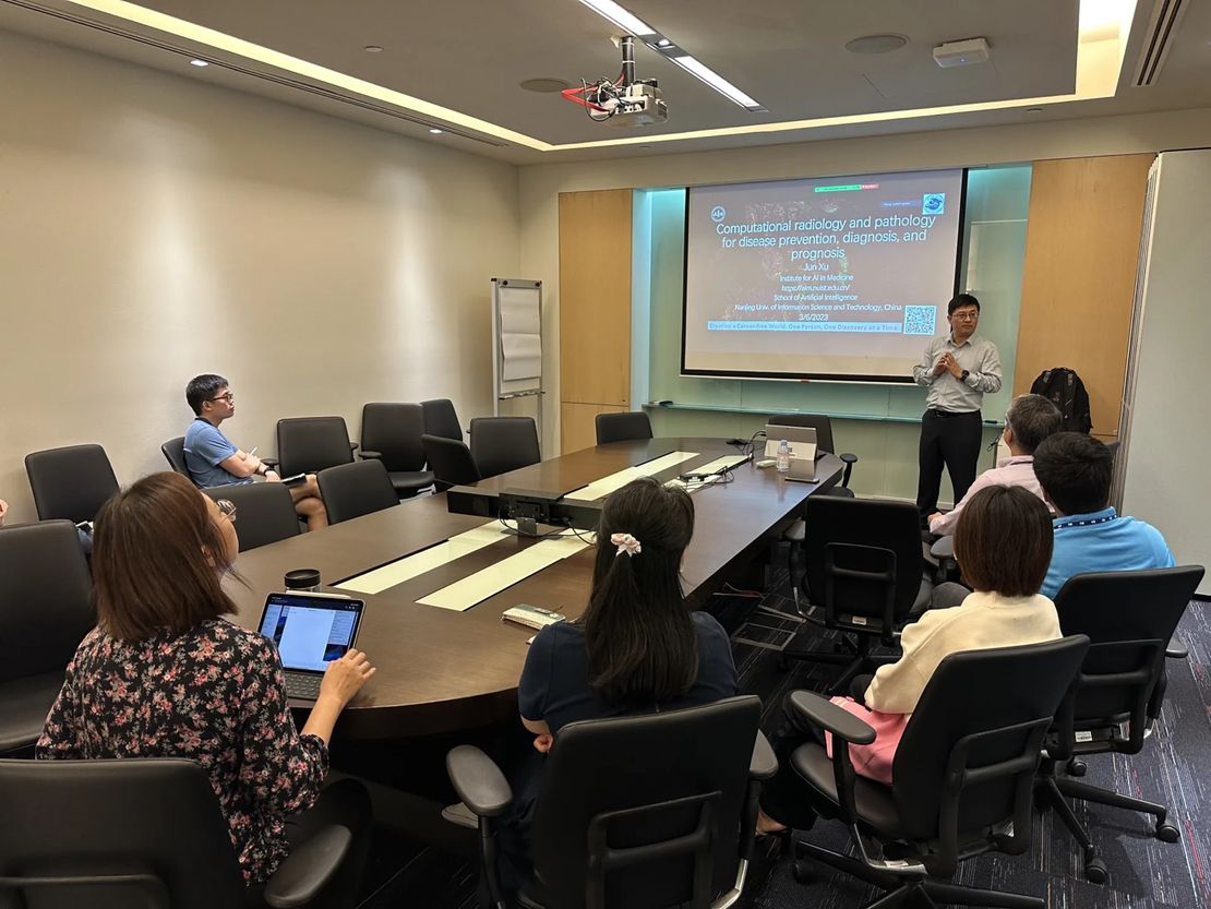 Professor Xu Jun visited the Singapore Science and Technology Agency and gave an academic report